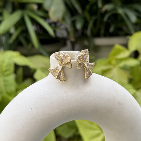 Crystal Bow Studs - Earrings from BLINGARI luxury Indian fashion collection