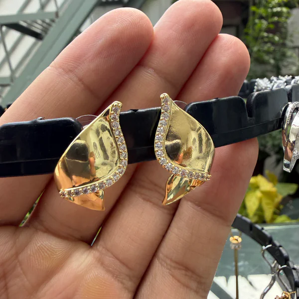 Crystal Seashell Studs - Earrings from BLINGARI luxury Indian fashion collection