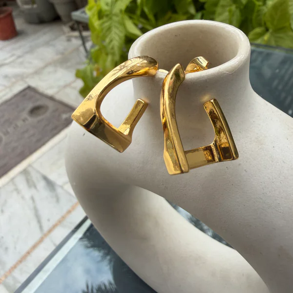 Golden Triangle Studs - Earrings from BLINGARI luxury Indian fashion collection