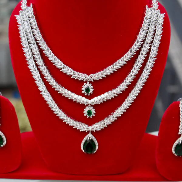 Aarya Emerald Set - Necklaces from BLINGARI luxury Indian fashion collection