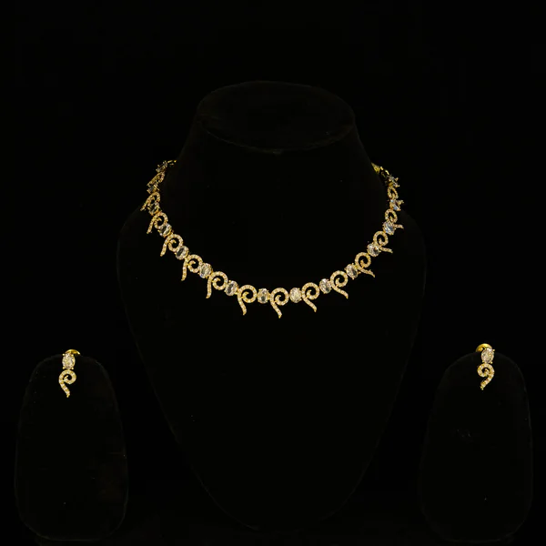 Golden Swirl Set - Necklaces from BLINGARI luxury Indian fashion collection